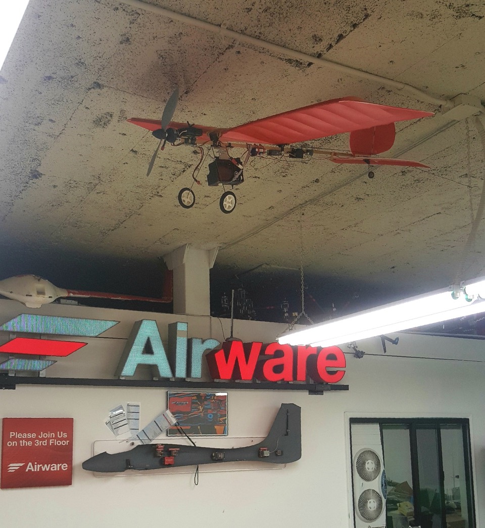 Airware sign with unmanned aircraft displayed above and below